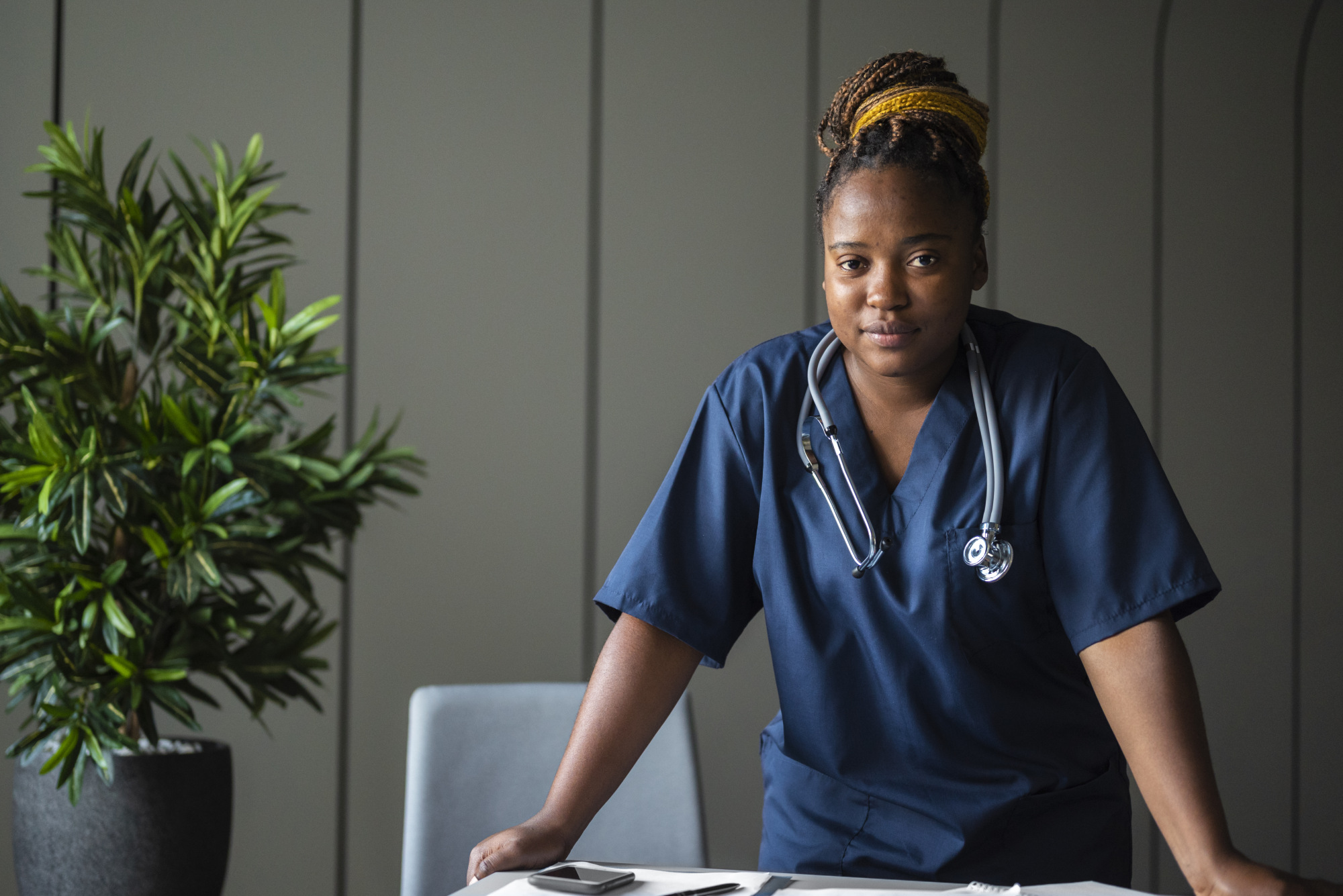 front-view-black-nurse-wearing-stethoscope-1